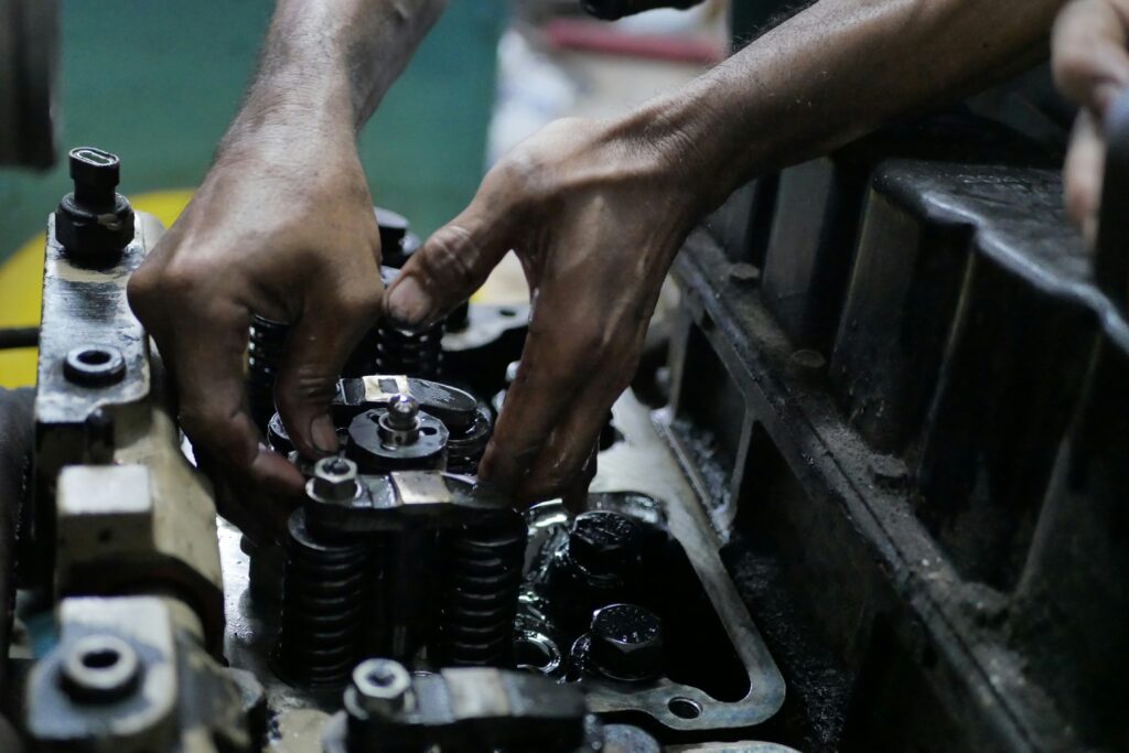 mechanic installing fuel pump in Westland MI